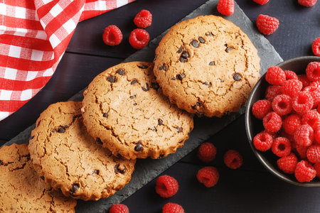 Oatmeal cookies with chocolate and berries.の写真素材