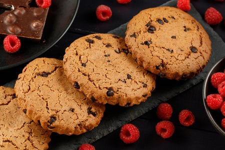 Americano cookies with chocolate and berries. Oatmeal cookies with chocolate.の写真素材
