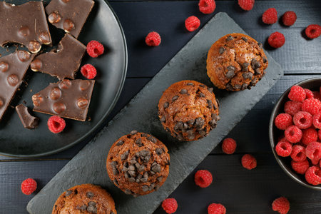 Chocolate muffins with berries and chocolate.の写真素材