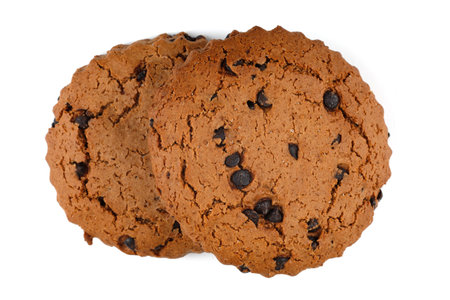 Oatmeal cookies with chocolate pieces on white isolateの写真素材
