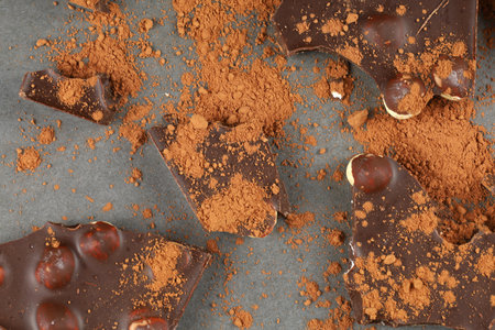Chocolate with nuts and cocoa close-upの写真素材