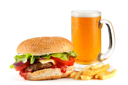 Burger with beer and french fries. Burger with beer isolate on white. Delicious classic burger with cutlet and glass of cold beerの写真素材