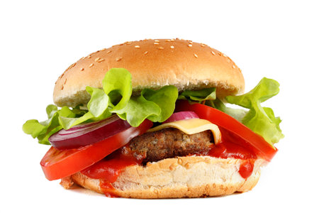 Tasty burger close-up. Burger with tomatoes, greens, onions and meat. Classic Burger close upの写真素材