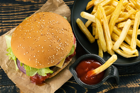 burger with french fries and sauce top view.の写真素材