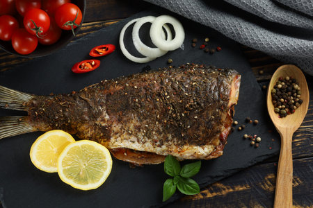 Fried carp fish on the table.の写真素材