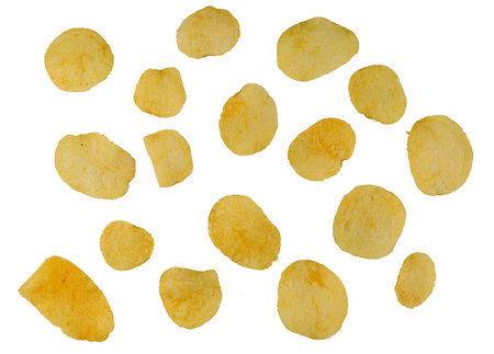 Many chips on white isolate. Potato chipsの写真素材
