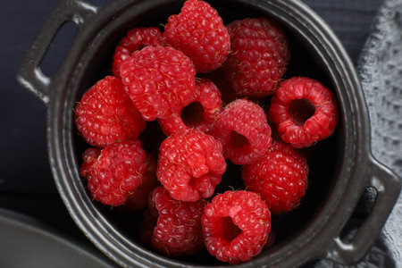 Raspberry berries in a bowlの写真素材