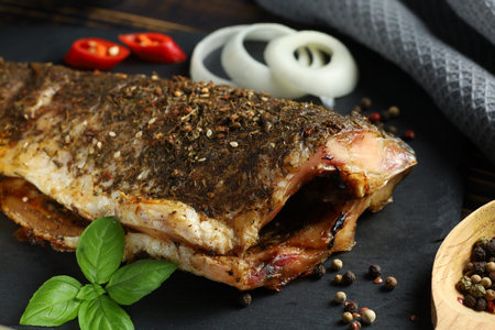 Baked fish on the table. baked carp.の写真素材