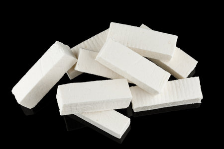 Pastilla white confectionery product on black.の写真素材