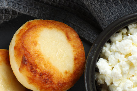 curd fritters close-up Food photo in a dark tone.の写真素材