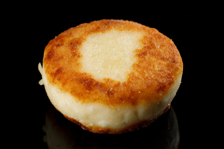 curd fritter Isolate on a black background.の写真素材