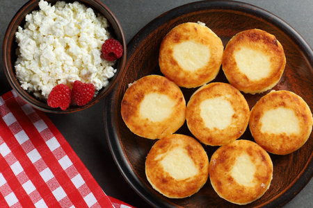 curd fritters on a plate in the village. traditional delicious food.の写真素材