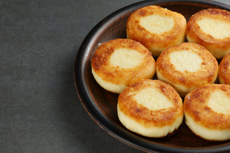 curd fritters on a plate. Sweet delicious cottage cheese pancakesの写真素材