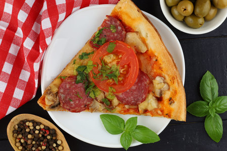 Sliced pizza on the table in the restaurant.の写真素材