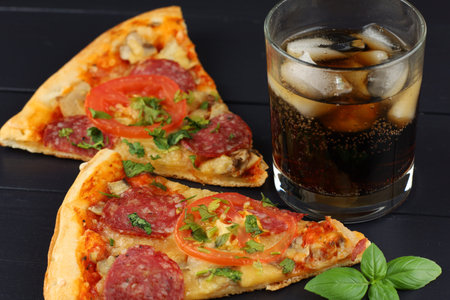 Pizza and cola with ice.の写真素材