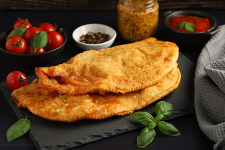 Chebureks with meat. Fried in oil chebureks with meat and herbs. street foodの写真素材