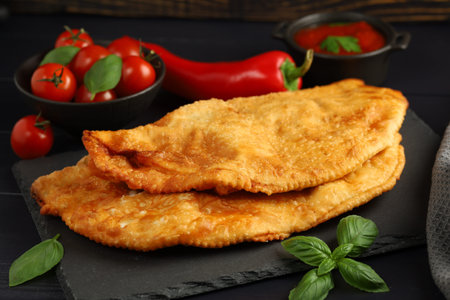 Chebureks with meat. Fried in oil chebureks with meat and herbs. street foodの写真素材