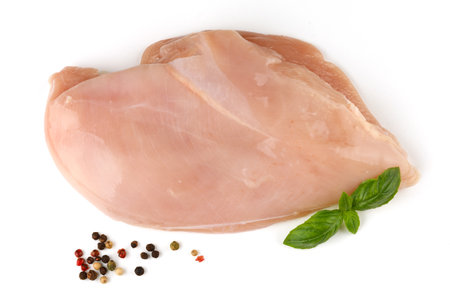 Raw chicken breasts and spices. fresh chicken breast. chicken breast fillets and seasoningsの写真素材