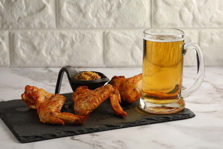 chicken wings and beer. Hearty and tasty food.の写真素材