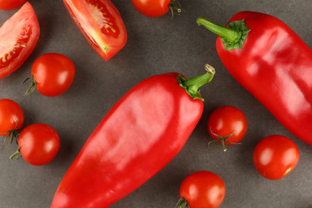 Tomatoes and sweet red peppers. red vegetables.の写真素材