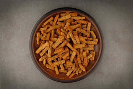 Rye crackers in a plate. Snacks rye crackers in a strip.の写真素材
