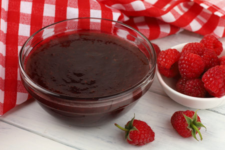 Raspberry jam in a glass vesselの写真素材