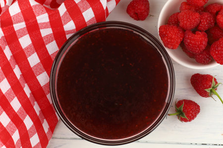Raspberry jam in a glass vesselの写真素材