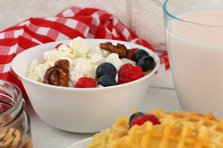 Homemade cheese with berries and nuts. breakfast food with Quarkの写真素材