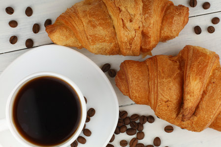 Croissant and coffee lifestyle. croissant on whiteの写真素材