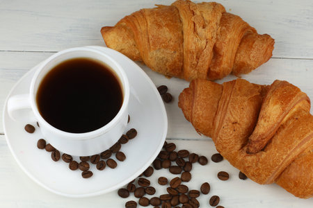 Coffee with croissants and grains. Light breakfast.の写真素材