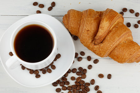 Croissant and coffee lifestyle. croissant on whiteの写真素材