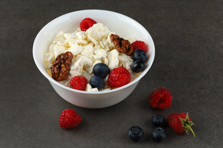 Homemade cheese with berries. Hearty and healthy breakfast. protein and vitaminsの写真素材
