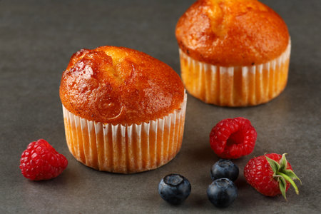 Muffins with berries. Hearty and healthy breakfastの写真素材