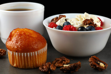 Homemade cheese with berries and nuts. breakfast food with Quarkの写真素材