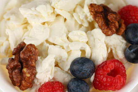 Homemade cheese with fruits. Useful and nutritious food. Proteins with vitamins. Fruit dessertの写真素材