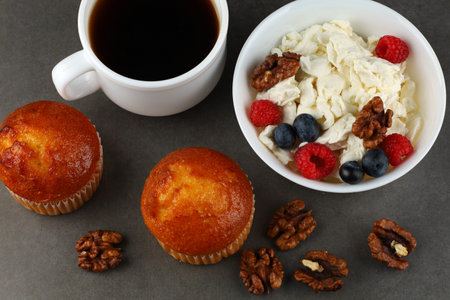 Breakfast with muffins. Delicious pastries on the tableの写真素材