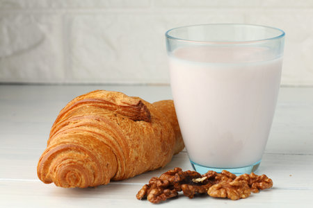 Croissant, nuts and yogurt. Healthy Eating.の写真素材