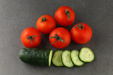 Tomatoes and cucumbers close-up. food of vegetariansの写真素材