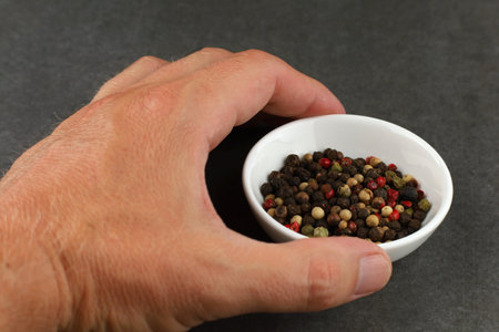 pepper mix seasoning in handの写真素材