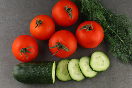 Tomatoes and cucumbers close-up. food of vegetariansの写真素材