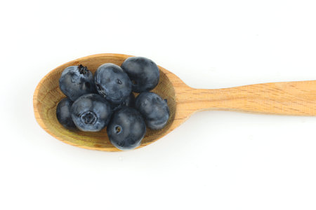 Blueberry in a spoon isolatesの写真素材