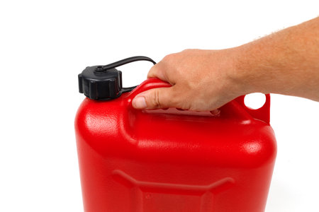 Red plastic canister for fuel isolateの写真素材