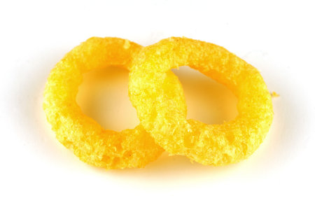 Corn rings. Yellow snacks isolateの写真素材