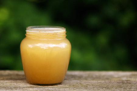 Honey in a jar place for text cope spaceの写真素材