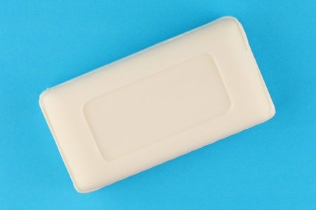 White soap on a blue backgroundの写真素材