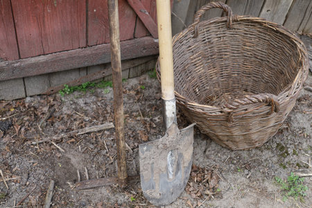 Shovel and rake in the village inverterの写真素材