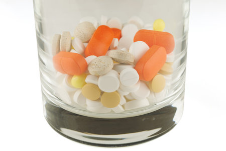 Lots of pills in a glassの写真素材