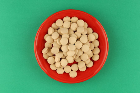 Brewer's yeast in tablets in a plateの写真素材