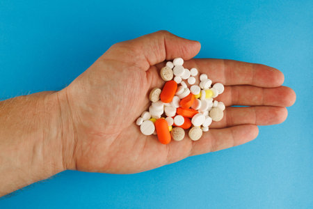 Lots of pills in handの写真素材
