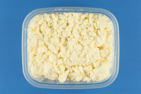 cottage cheese in a plastic containerの写真素材